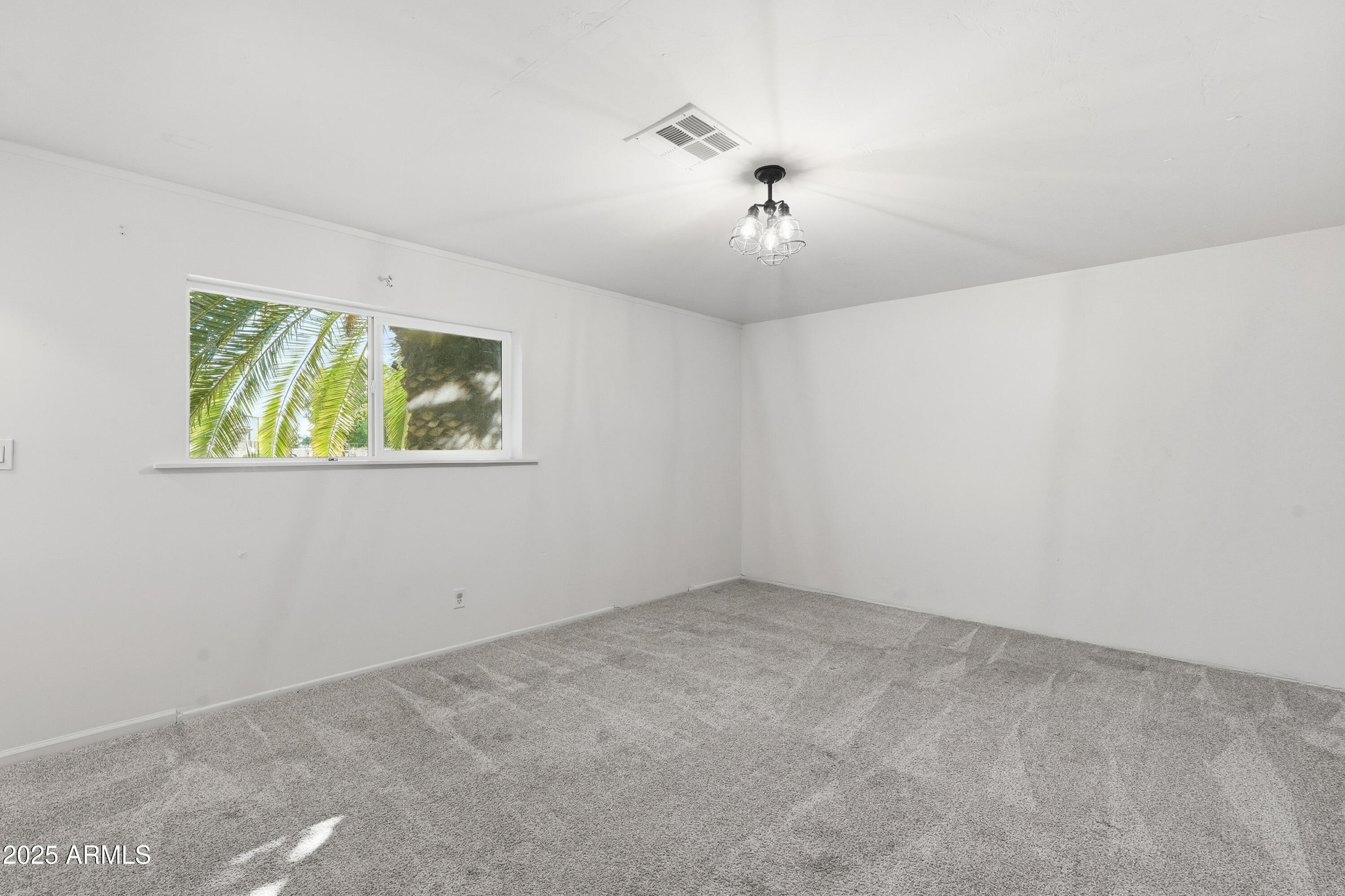 21047 South 156th Street Gilbert, AZ 85298 - Photo 25 of 40 a view of an empty room with a window