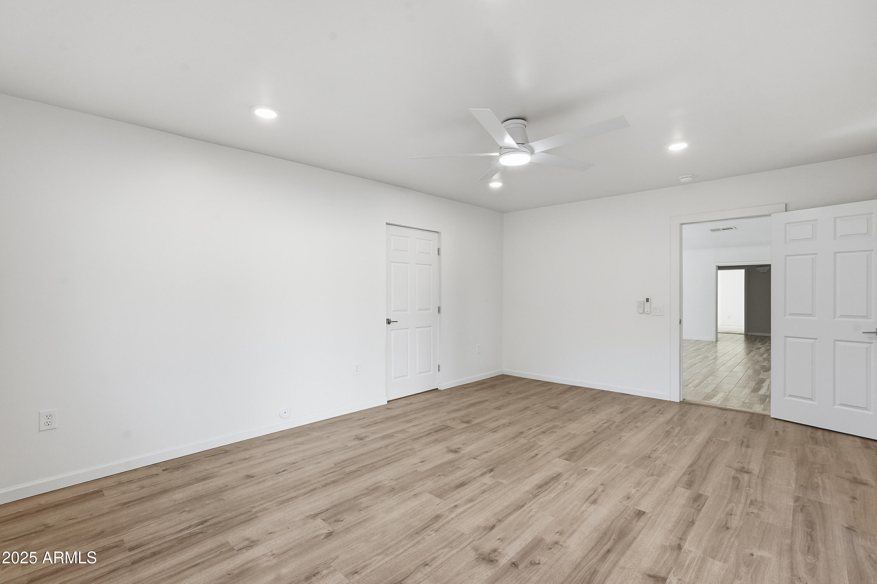 21047 South 156th Street Gilbert, AZ 85298 - Photo 29 of 40 a view of empty room with wooden floor