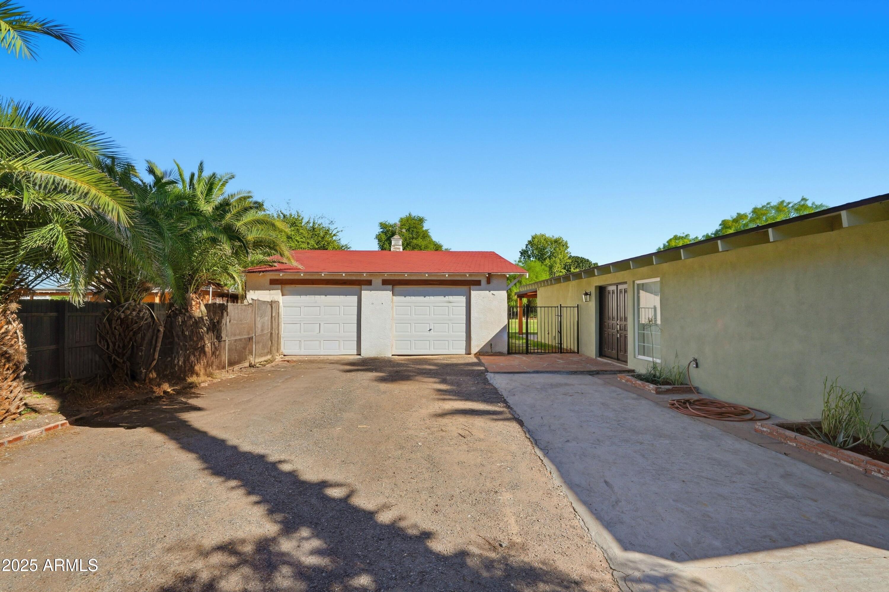 21047 South 156th Street Gilbert, AZ 85298 - Photo 31 of 40 a view of a house with a yard