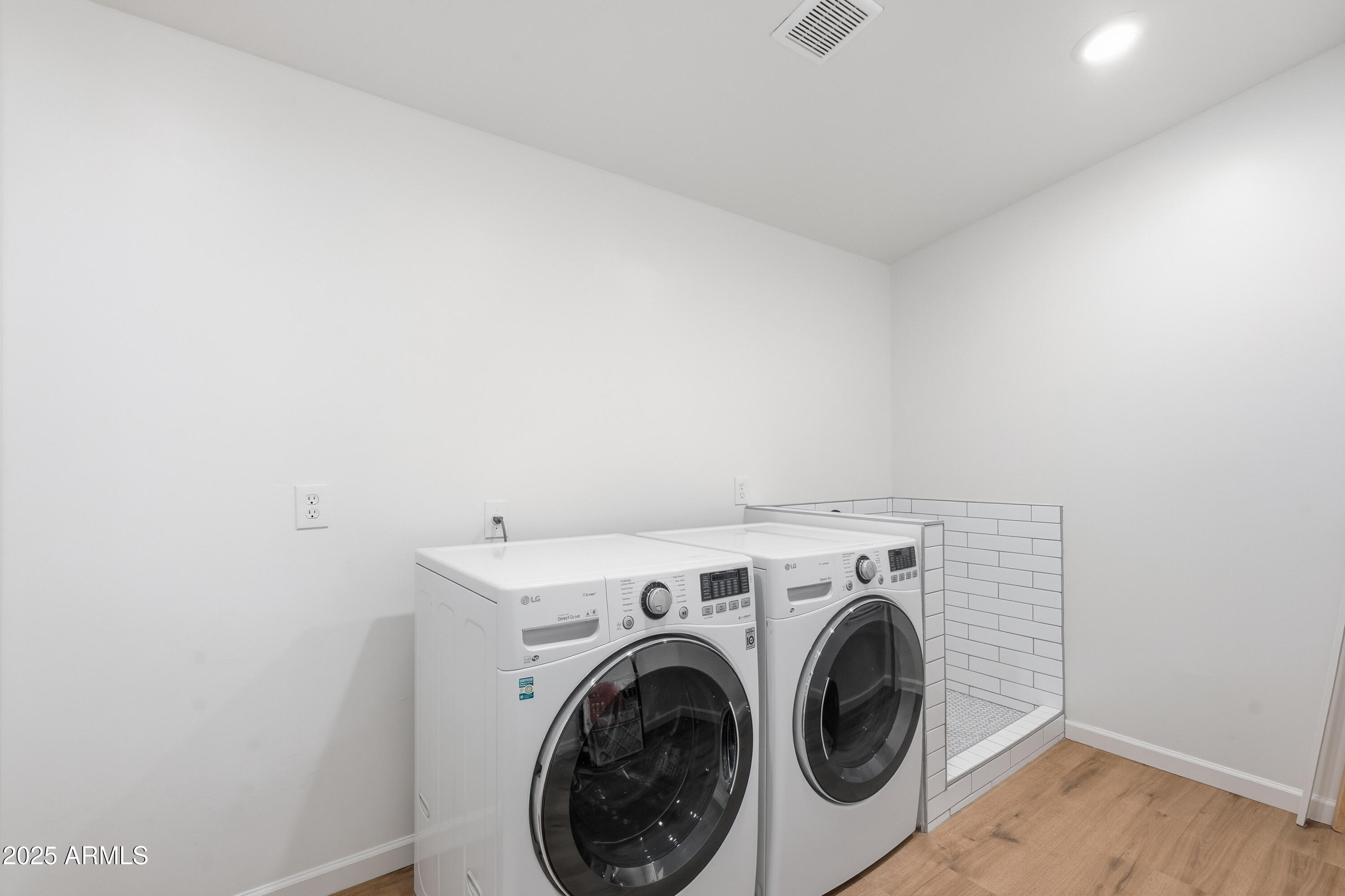 21047 South 156th Street Gilbert, AZ 85298 - Photo 35 of 40 a utility room with dryer and washer