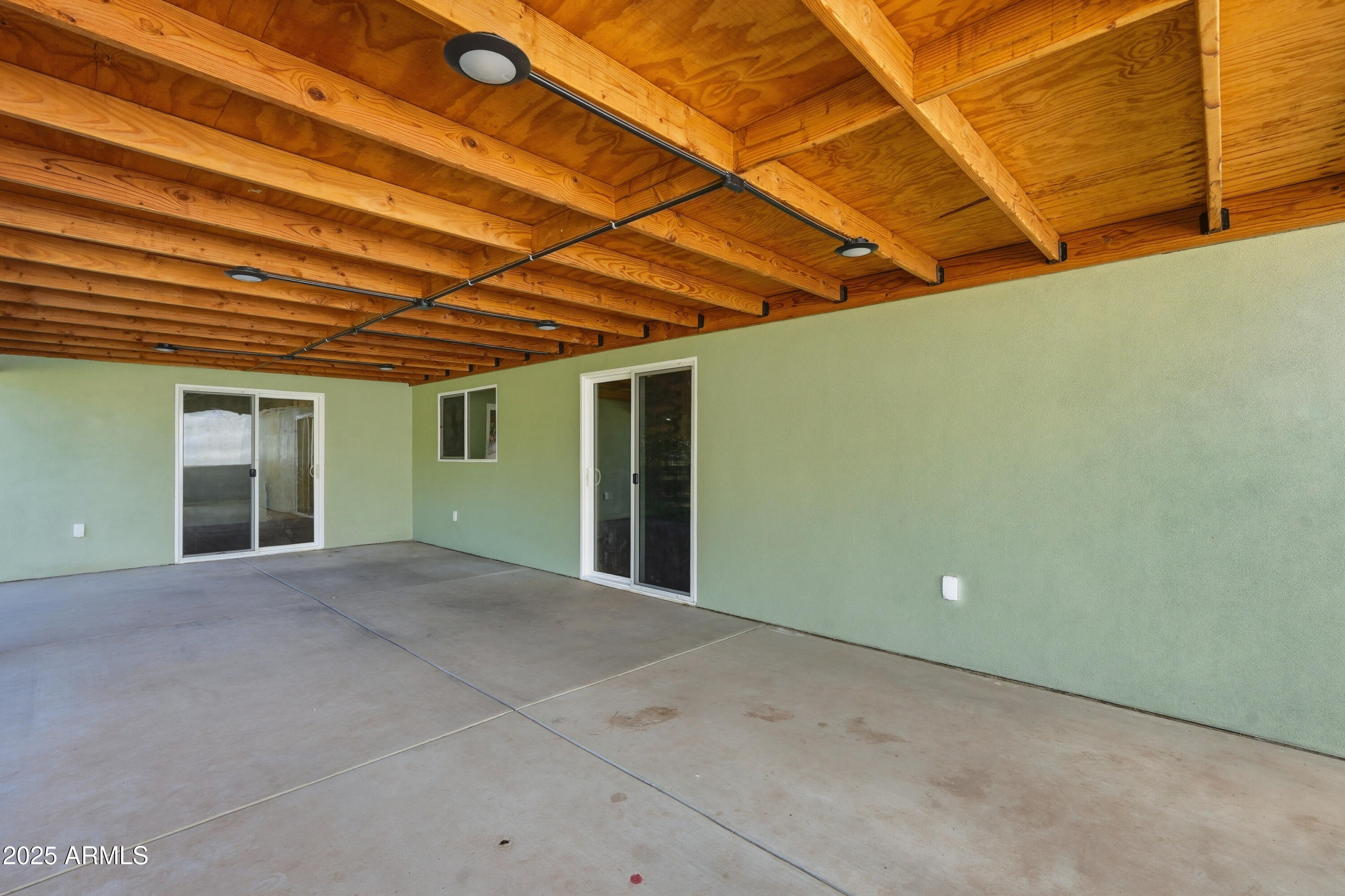 21047 South 156th Street Gilbert, AZ 85298 - Photo 37 of 40 a view of a room with a ceiling fan
