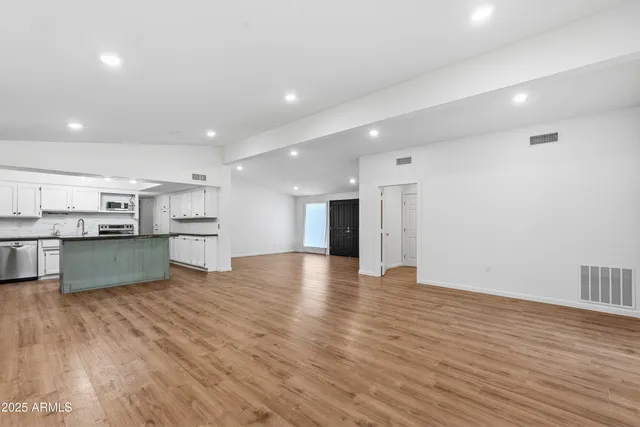a view of kitchen with wooden floor