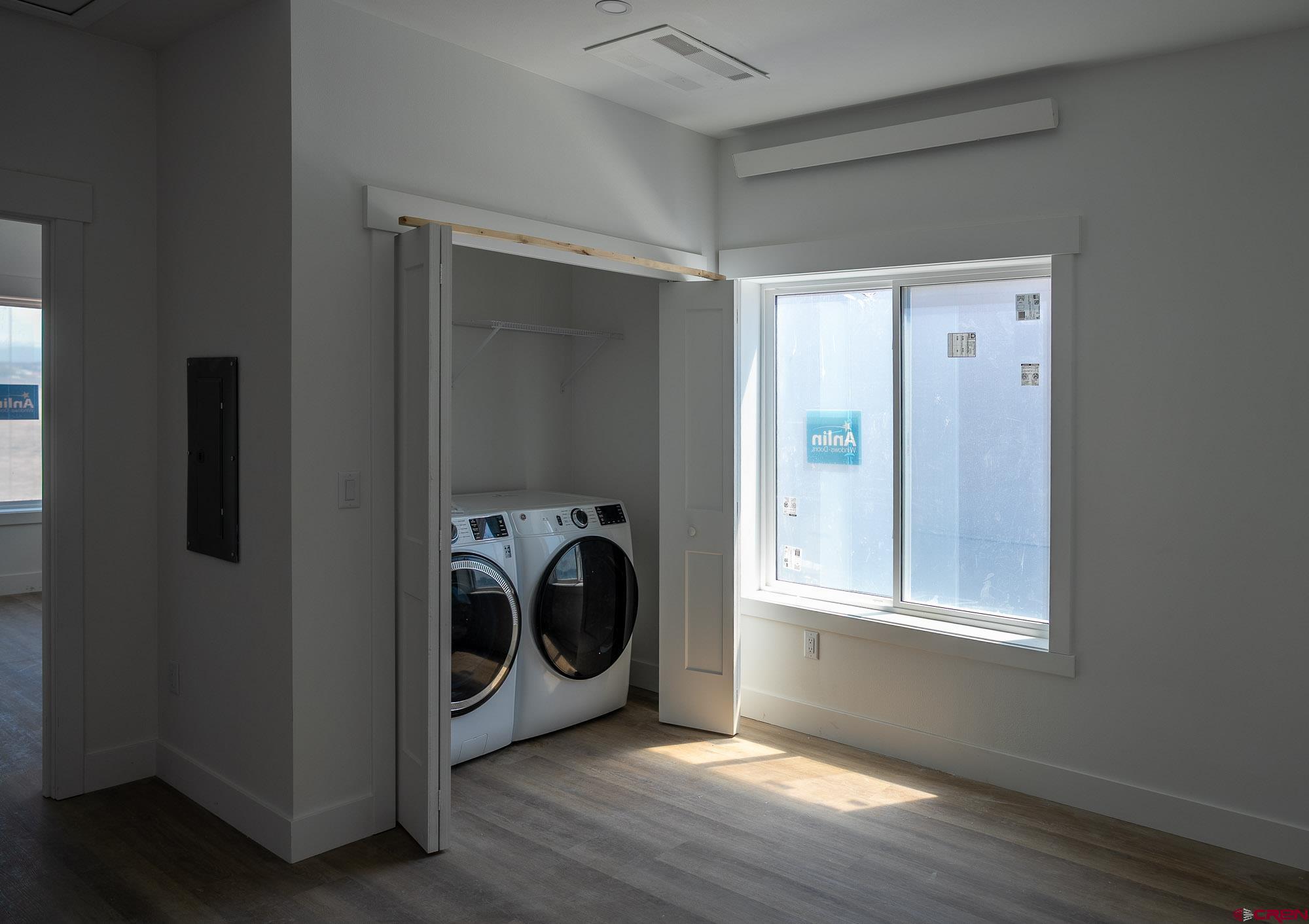 160 Manzano Circle Ignacio, CO 81137 - Photo 3 of 10 a view of a storage & utility room with washer and dryer