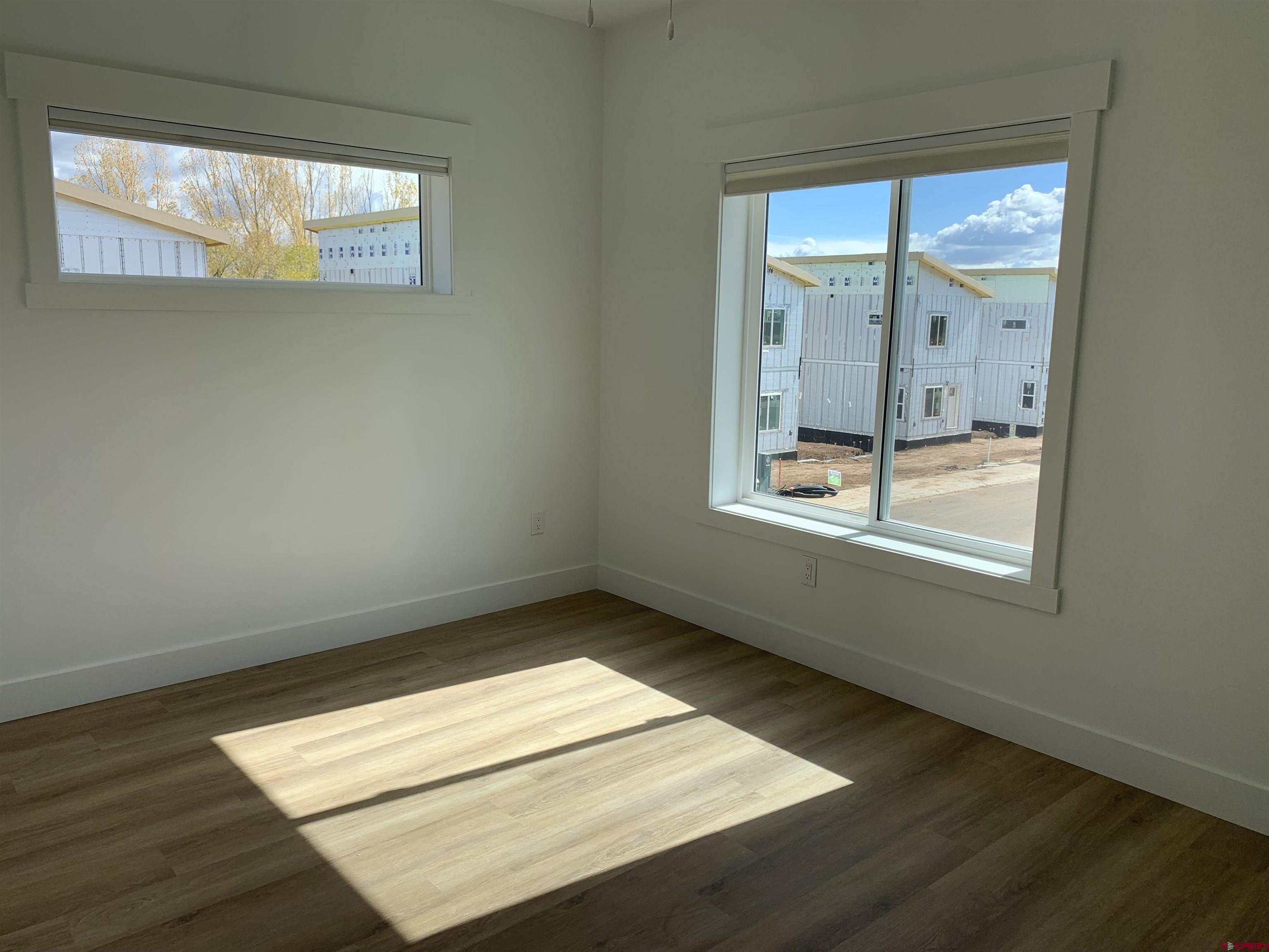 160 Manzano Circle Ignacio, CO 81137 - Photo 7 of 10 a view of an empty room and window
