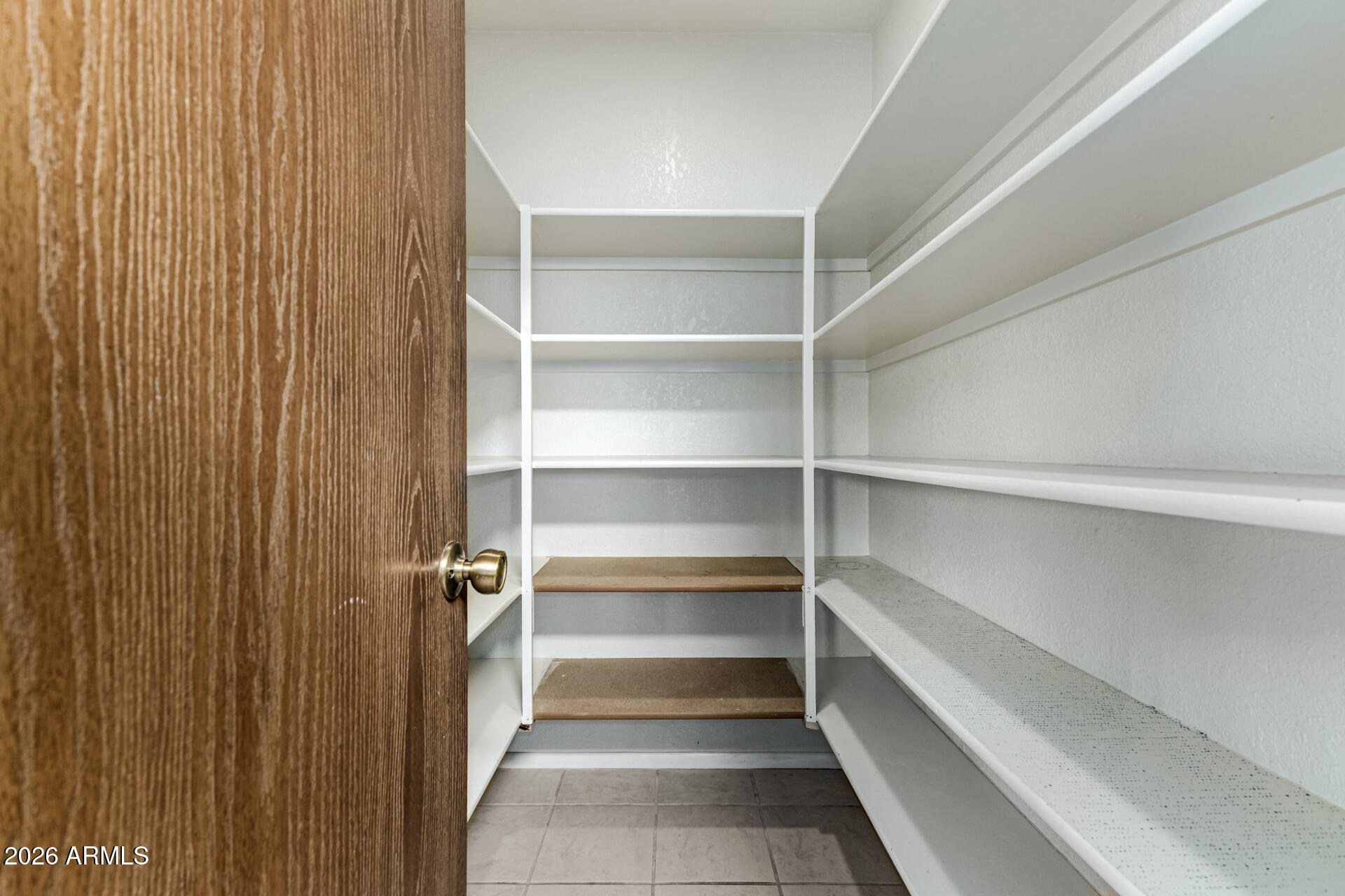 7926 West Shangri-la Road Peoria, AZ 85345 - Photo 12 of 32 a view of a walk in closet