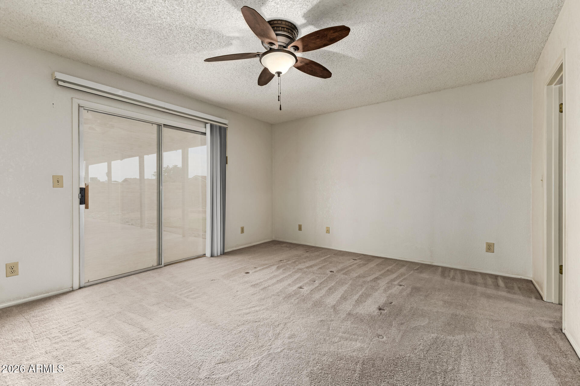 7926 West Shangri-la Road Peoria, AZ 85345 - Photo 13 of 32 an empty room with fan