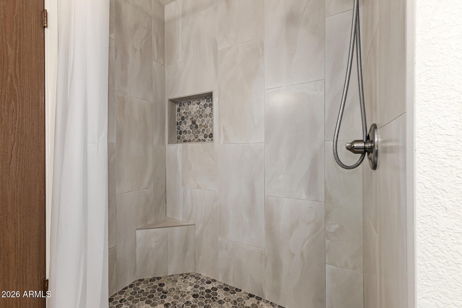7926 West Shangri-la Road Peoria, AZ 85345 - Photo 17 of 32 a bathroom with a shower