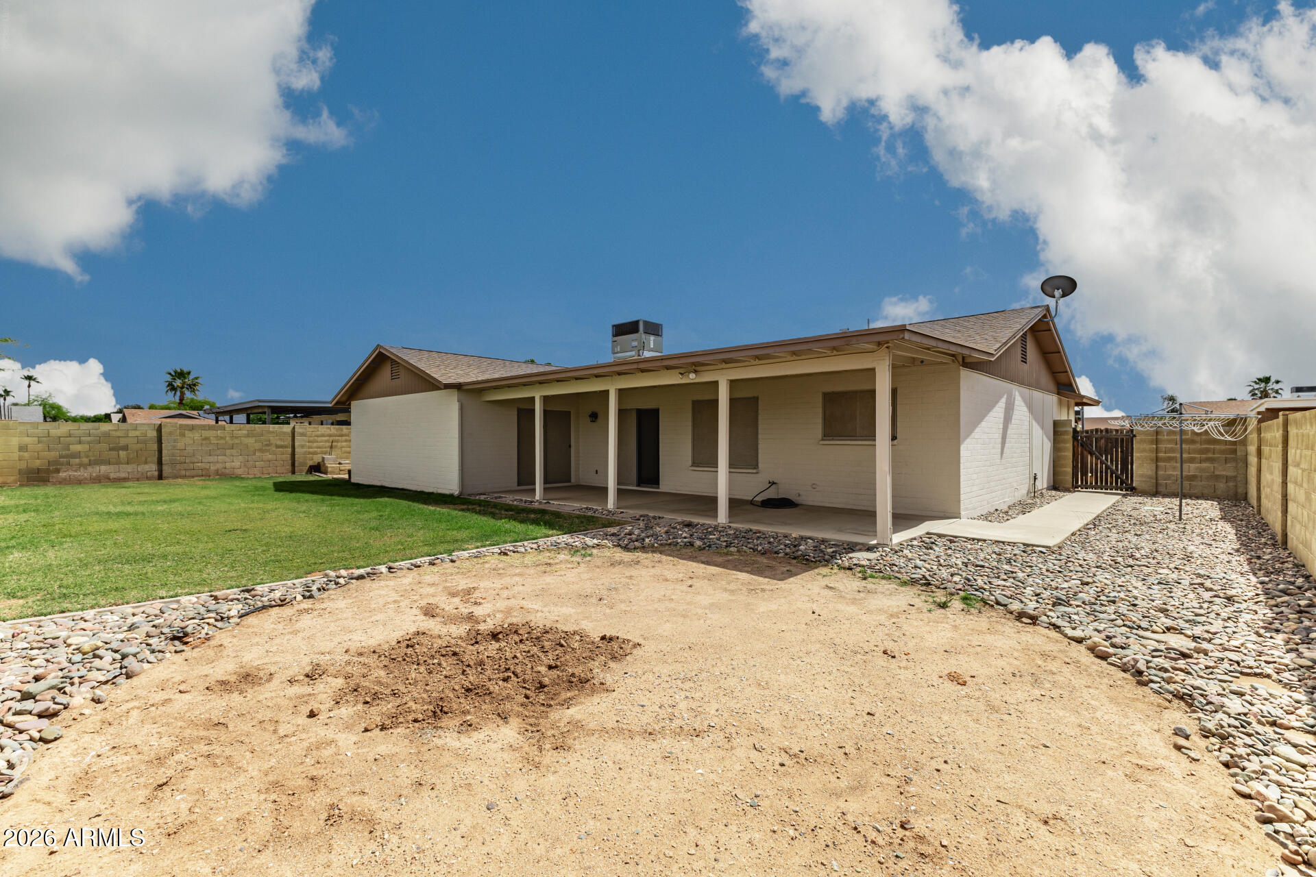 7926 West Shangri-la Road Peoria, AZ 85345 - Photo 29 of 32 a front view of a house with a yard