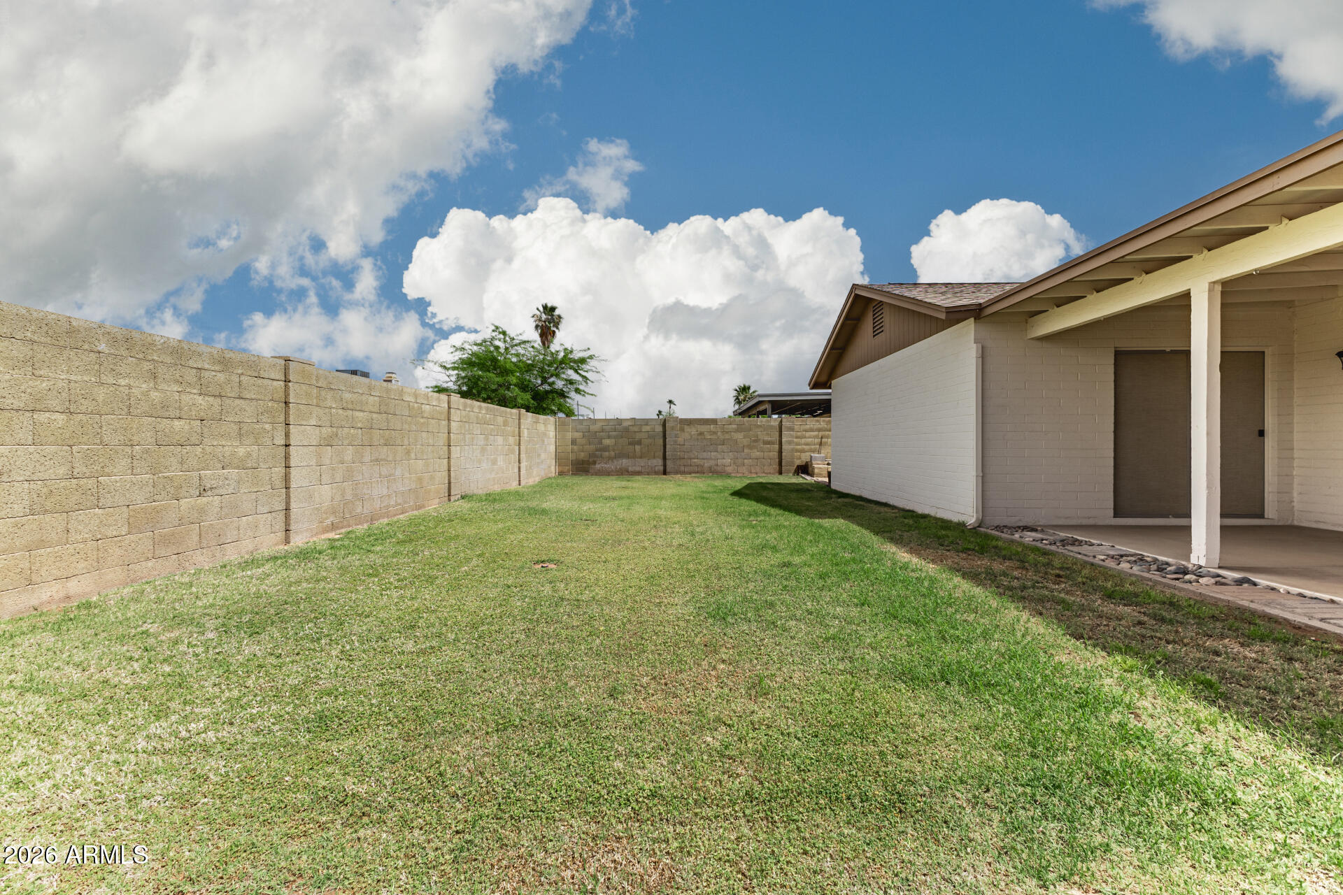 7926 West Shangri-la Road Peoria, AZ 85345 - Photo 30 of 32 a view of a porch with a bench