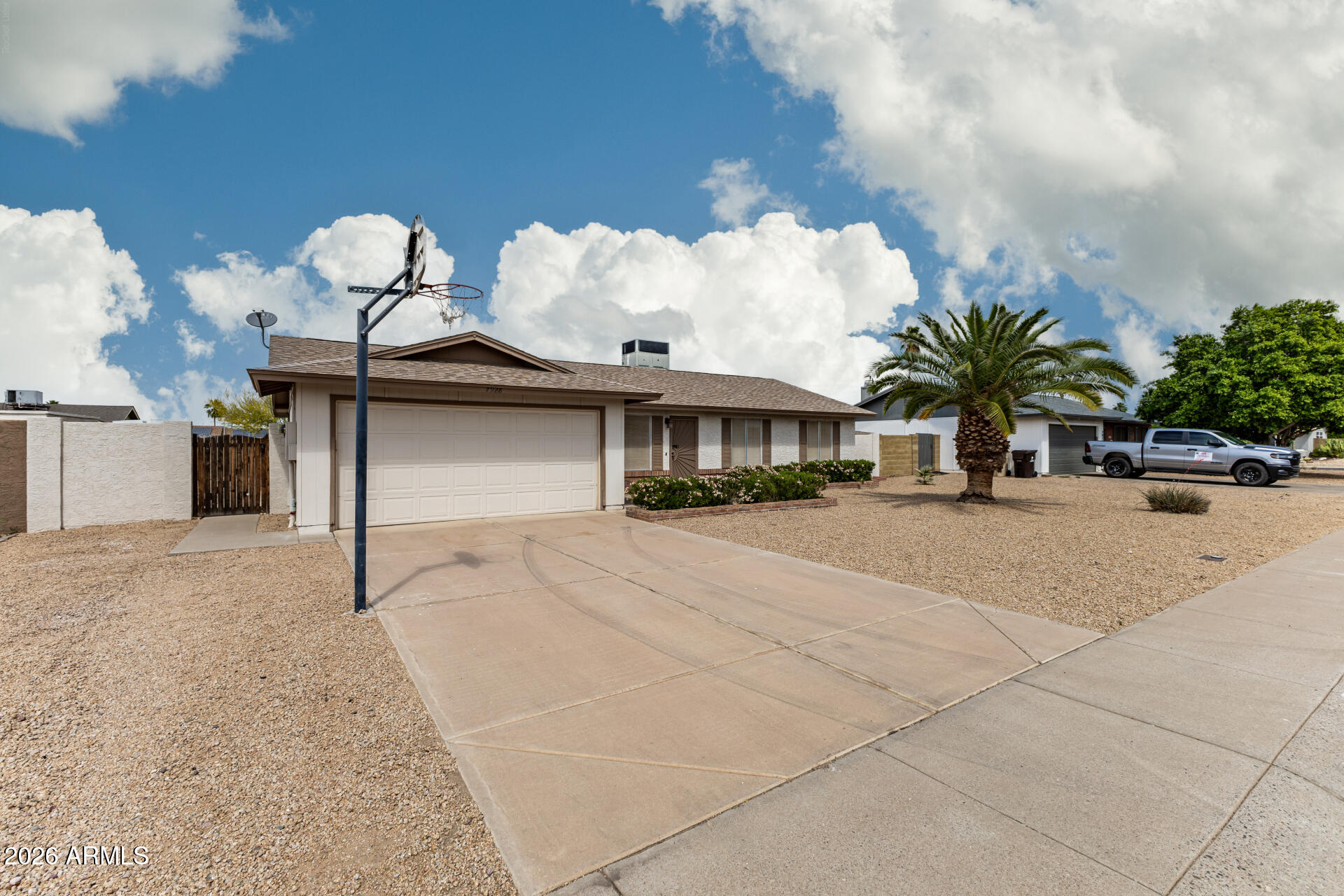 7926 West Shangri-la Road Peoria, AZ 85345 - Photo 3 of 32 a house view with a garden space