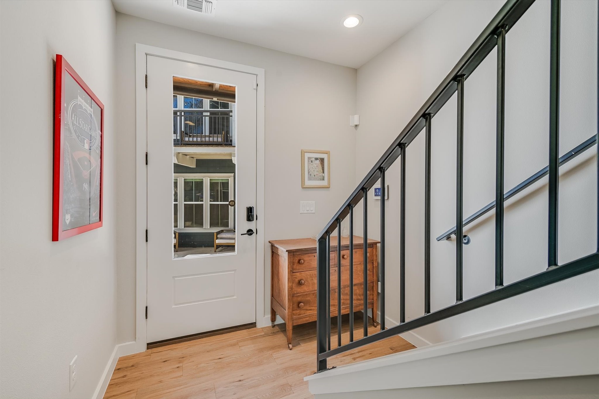 3809 Valley View Road, Unit 7 Austin, TX 78704 - Photo 3 of 21 Entrance foyer with light hardwood / wood-style flooring
