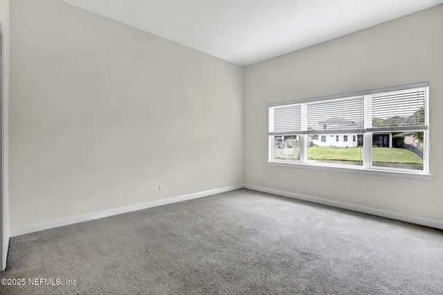 an empty room with a window