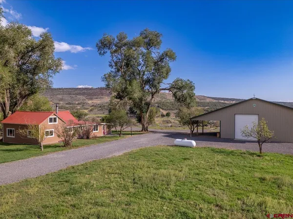a house view with a garden space