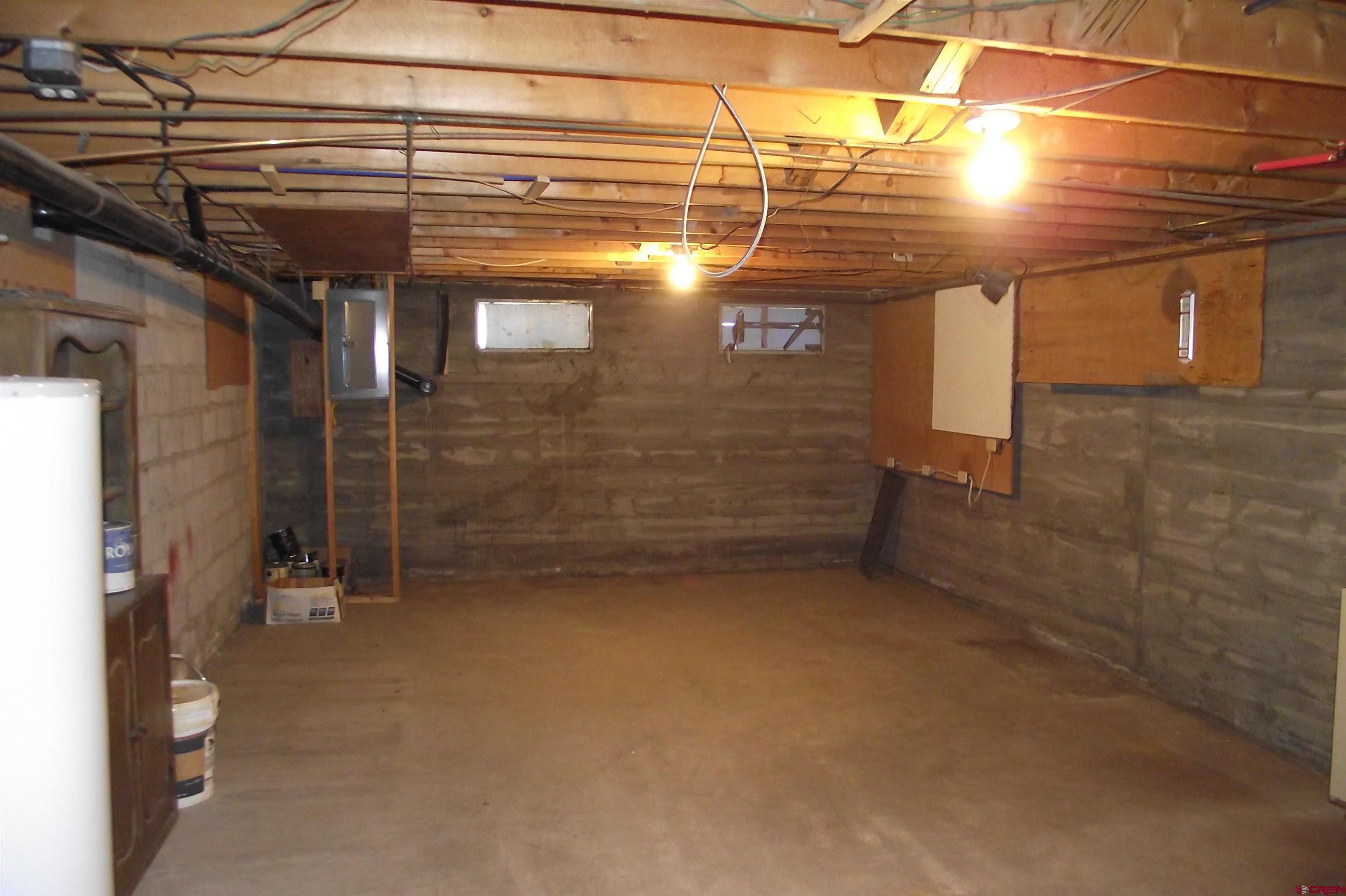 27434 Cedar Mesa Road Cedaredge, CO 81413 - Photo 32 of 36 a view of storage and utility room