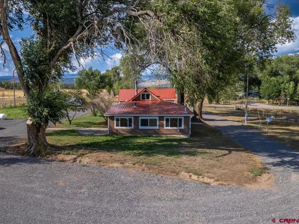 a view of house with outdoor space area
