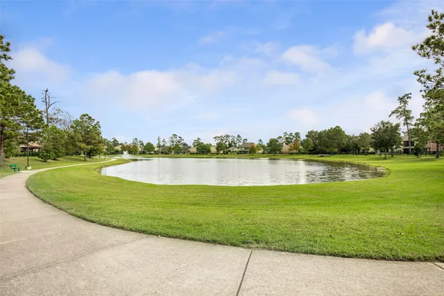 a view of a lake with a big yard