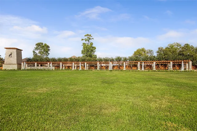 a view of a house with a big yard