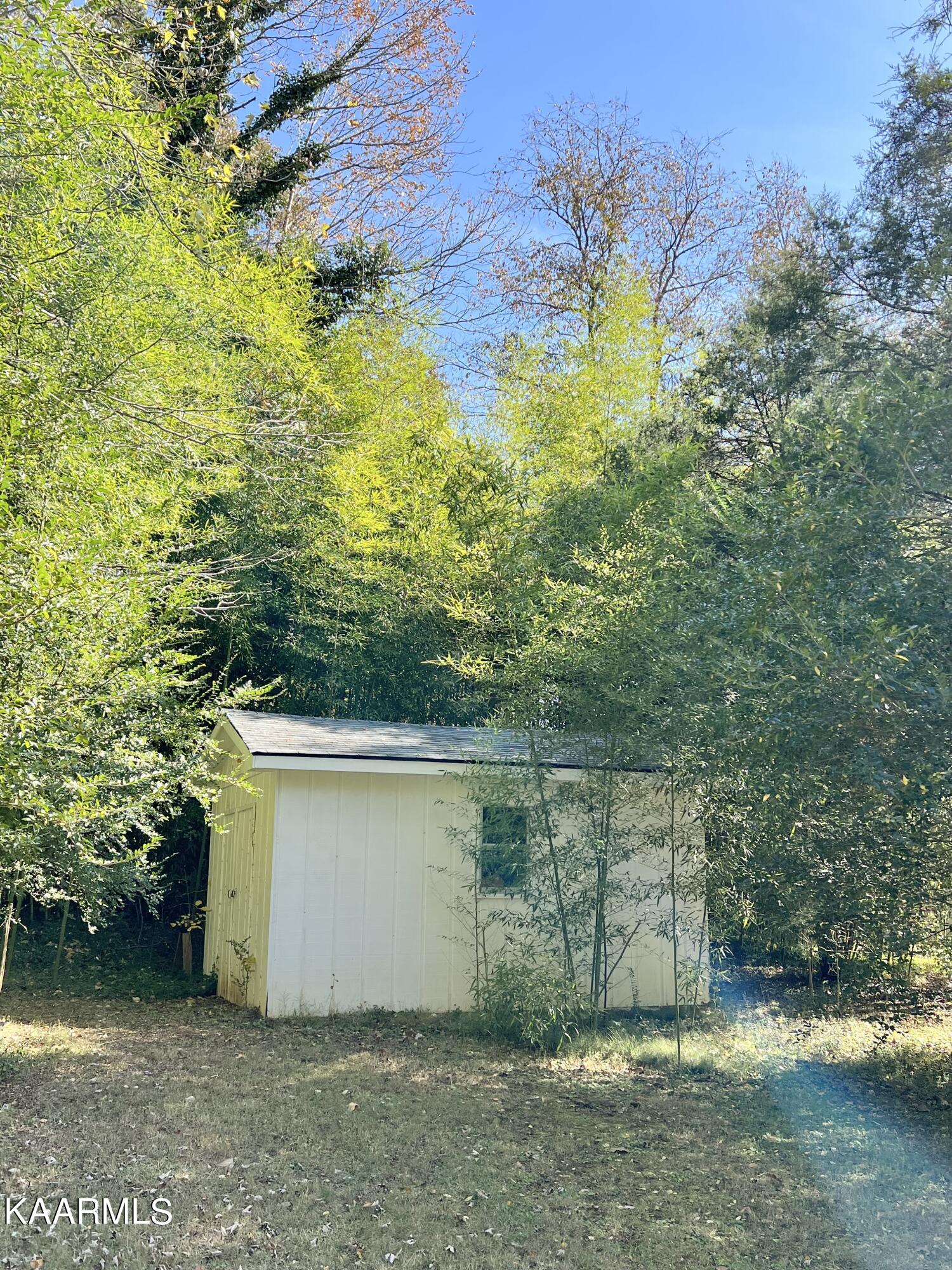 100 East Melbourne Road Oak Ridge, TN 37830 - Photo 44 of 46 Storage Shed Tucked Away in Backyard