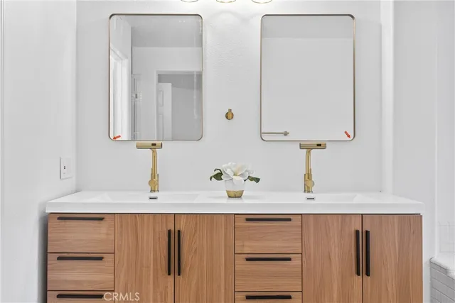 an aerial view of a residential apartment building with a yard