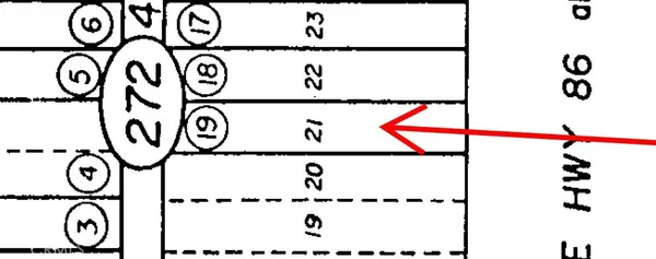 a picture of a bathroom with a sink and a white rack