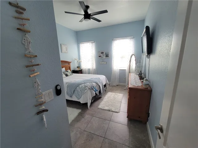 a room with furniture and a flat screen tv