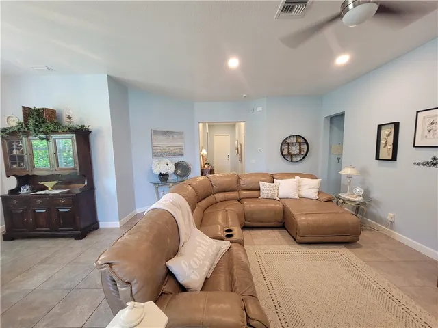 a living room with furniture and a couch