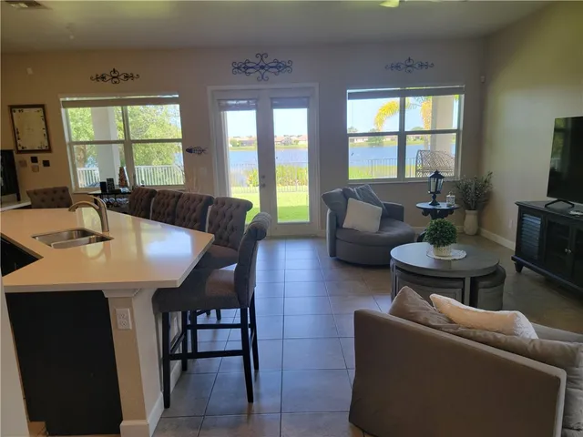 a living room with furniture and a table
