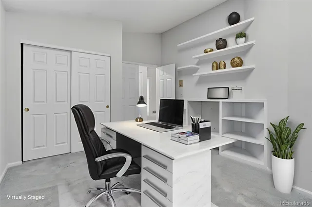a view of an empty room with shelves