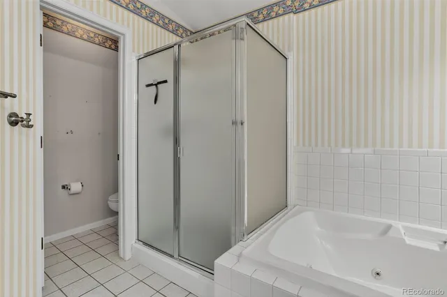 a bathroom with a bathtub and a sink