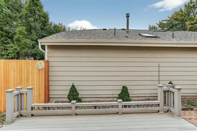 a living room with furniture flat screen tv and a fireplace