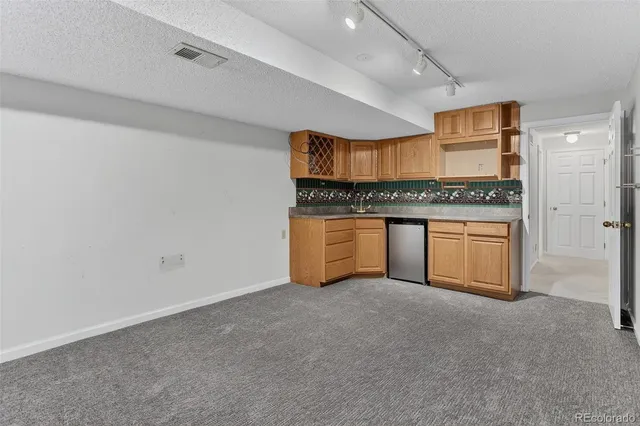 a view of kitchen and utility room