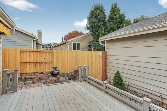 a view of a door and chair in the balcony