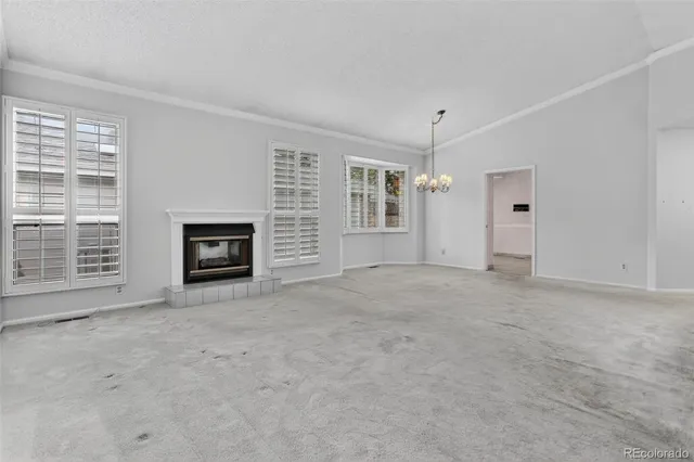 a view of an empty room with a bathroom