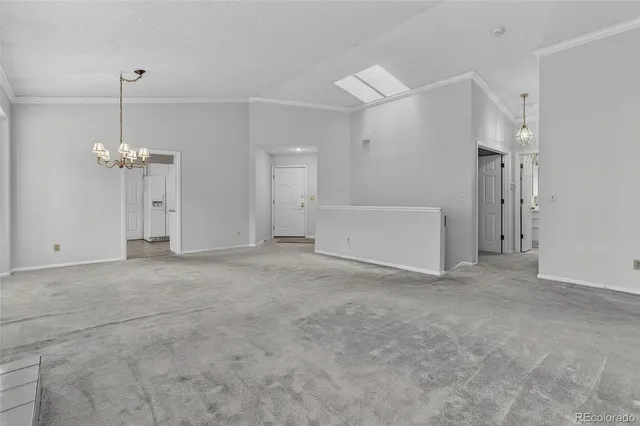 a kitchen with cabinets stainless steel appliances and a sink