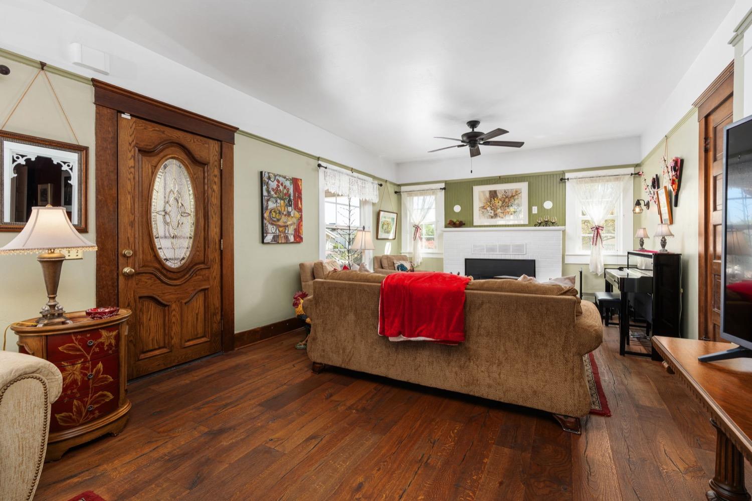 406 Oxford Avenue Clovis, CA 93612 - Photo 17 of 89 a living room with furniture and a fireplace