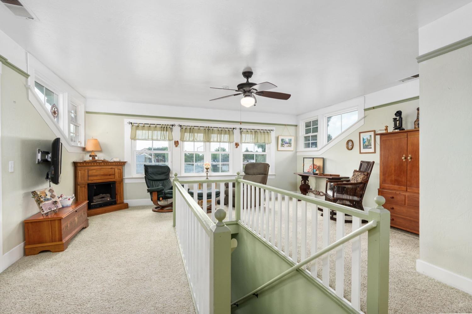 406 Oxford Avenue Clovis, CA 93612 - Photo 49 of 89 a view of a livingroom with a fireplace