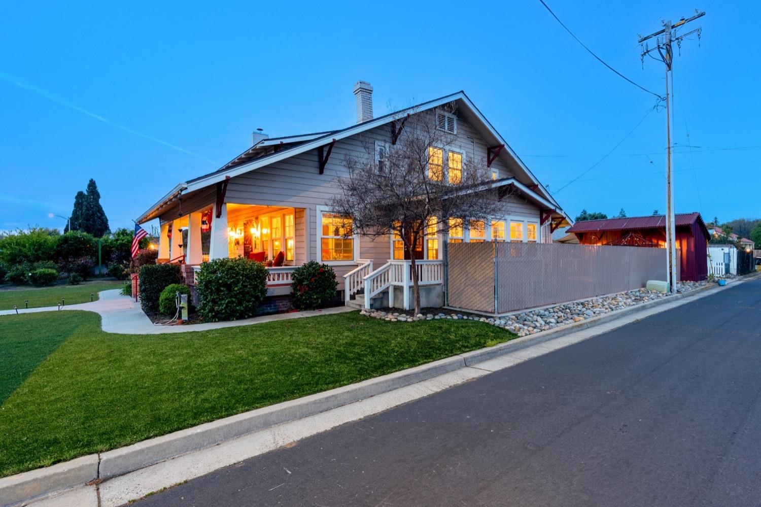 406 Oxford Avenue Clovis, CA 93612 - Photo 6 of 89 a front view of a house with a yard