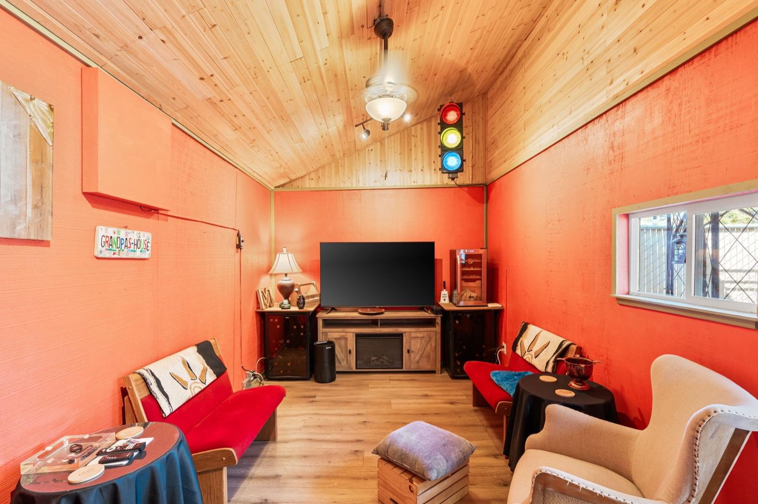 406 Oxford Avenue Clovis, CA 93612 - Photo 73 of 89 a living room with furniture and a flat screen tv