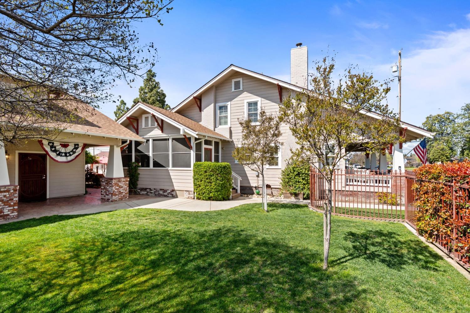 406 Oxford Avenue Clovis, CA 93612 - Photo 80 of 89 a front view of a house with a yard and porch