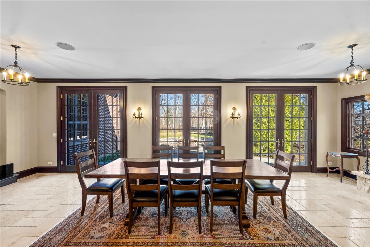 936 Ringwood Road Lake Forest, IL 60045 - Photo 11 of 58 a view of a a dining room with furniture window and outside view