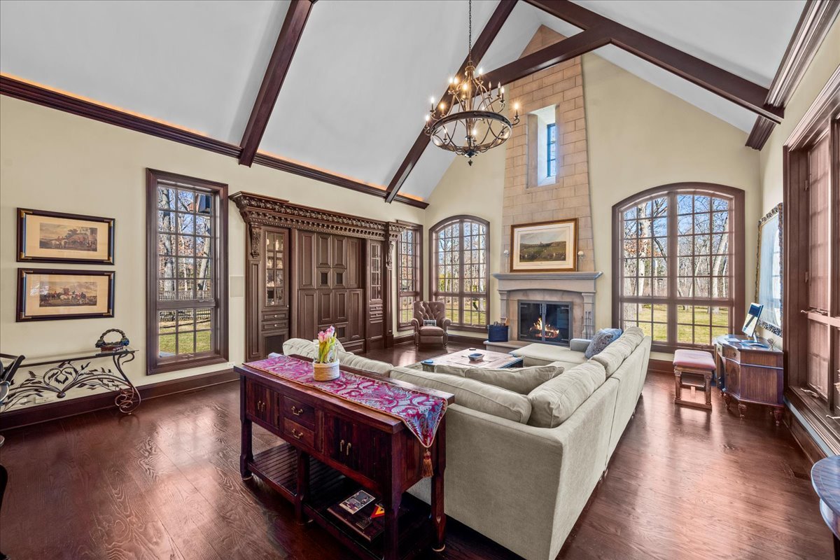 936 Ringwood Road Lake Forest, IL 60045 - Photo 16 of 58 a living room with furniture fireplace and wooden floor