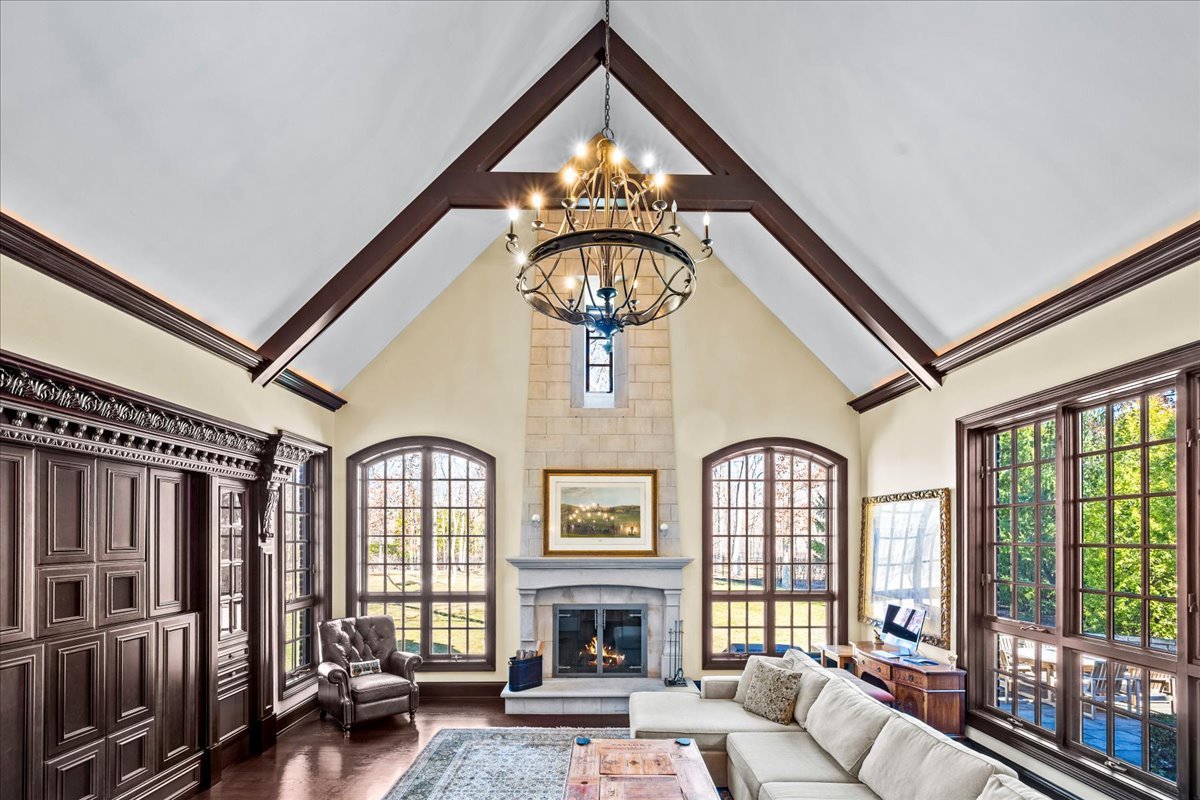 936 Ringwood Road Lake Forest, IL 60045 - Photo 17 of 58 a living room with furniture a fireplace and a large window