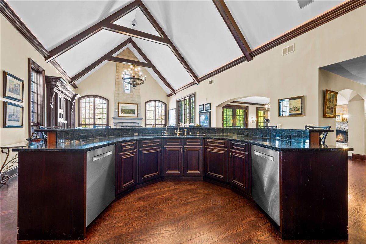936 Ringwood Road Lake Forest, IL 60045 - Photo 25 of 58 a kitchen with stainless steel appliances granite countertop a stove and cabinets