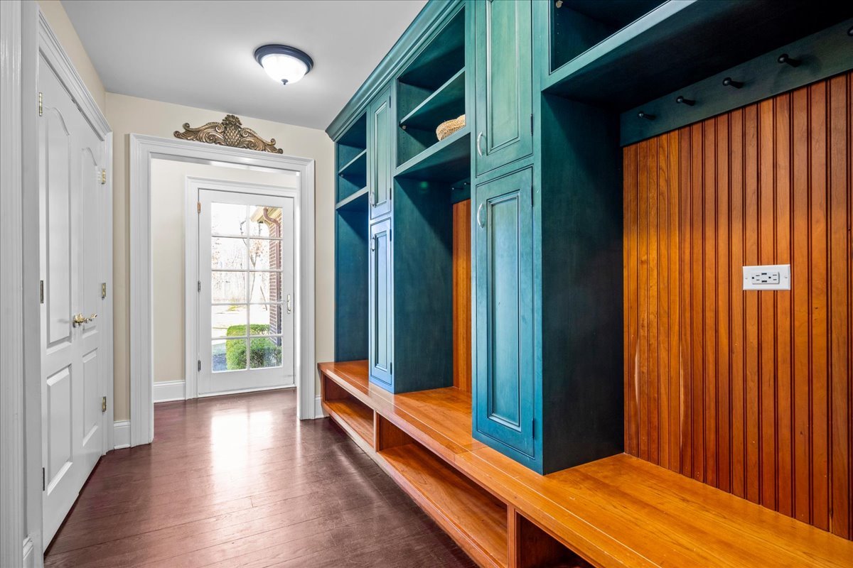 936 Ringwood Road Lake Forest, IL 60045 - Photo 30 of 58 a view of a hallway with wooden floor and windows