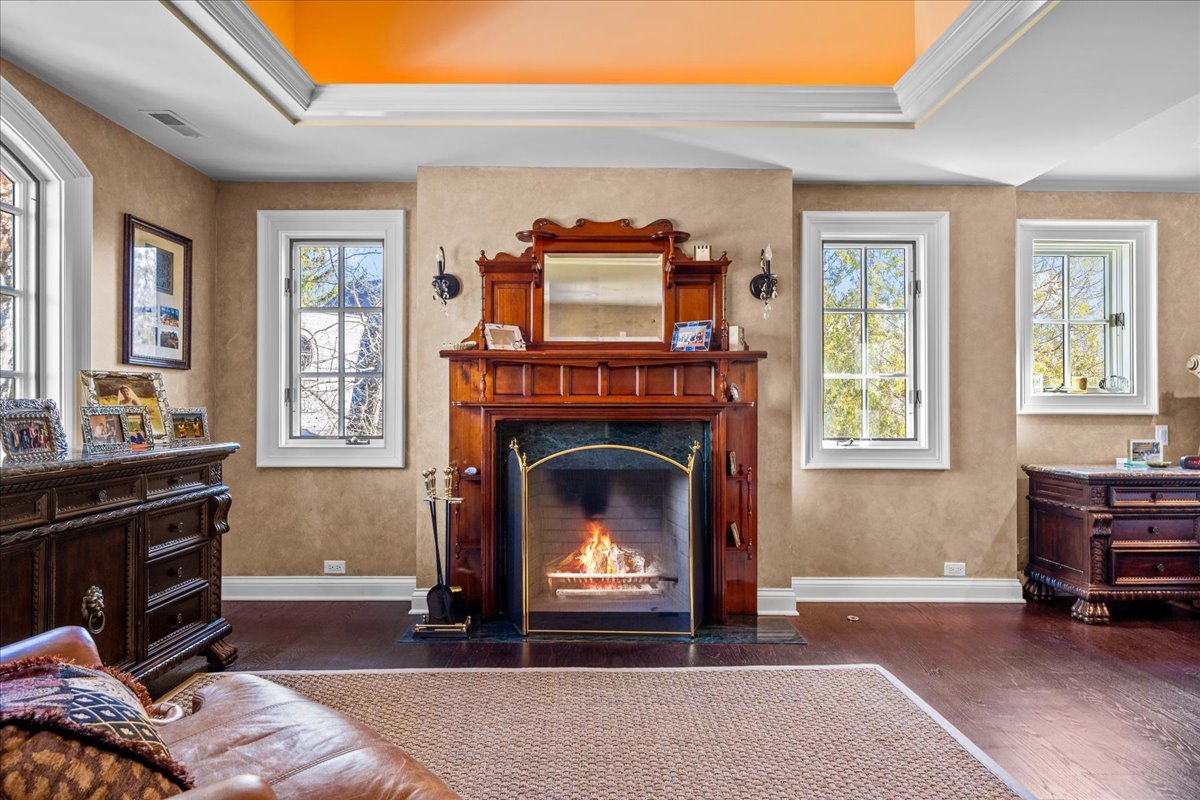 936 Ringwood Road Lake Forest, IL 60045 - Photo 33 of 58 a living room with furniture and a fireplace