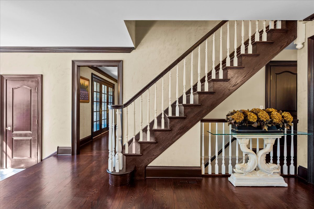 936 Ringwood Road Lake Forest, IL 60045 - Photo 4 of 58 a view of entryway with wooden floor and stairs