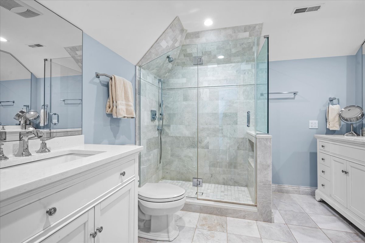 936 Ringwood Road Lake Forest, IL 60045 - Photo 44 of 58 a bathroom with a sink a toilet and shower