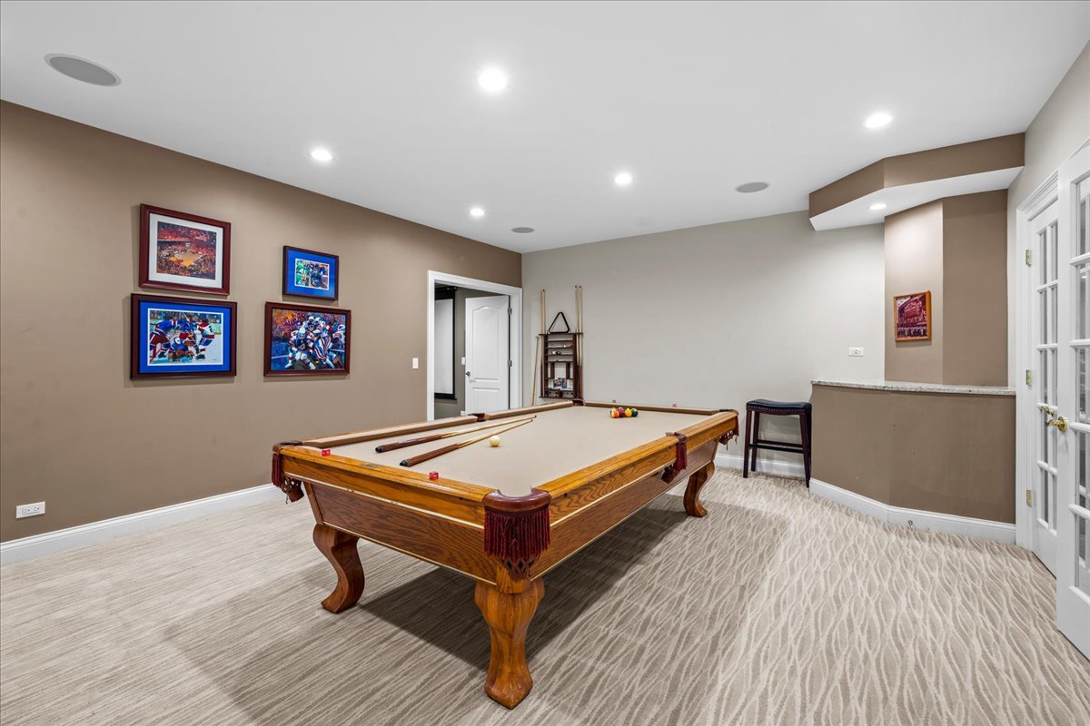 936 Ringwood Road Lake Forest, IL 60045 - Photo 47 of 58 a room with pool table and a rug