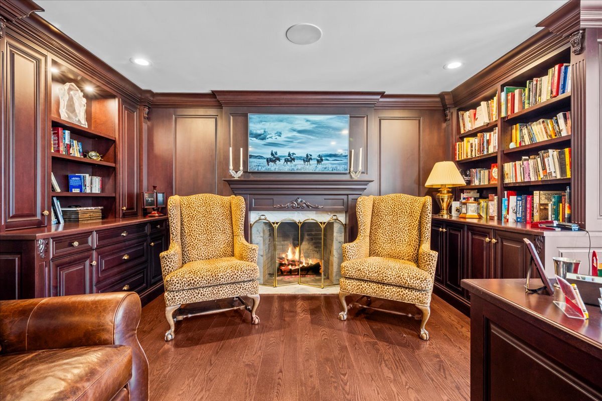 936 Ringwood Road Lake Forest, IL 60045 - Photo 6 of 58 a living room with furniture and a book shelf