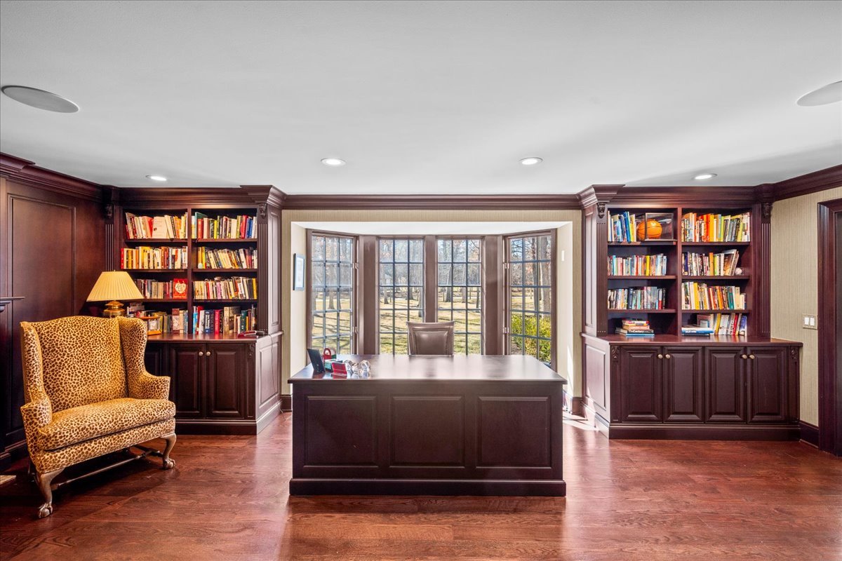 936 Ringwood Road Lake Forest, IL 60045 - Photo 7 of 58 a living room with furniture and a book shelf